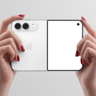Hands with red painted nails holding a foldable smartphone flat, showing the white rear case with Apple logo and a blank front display.