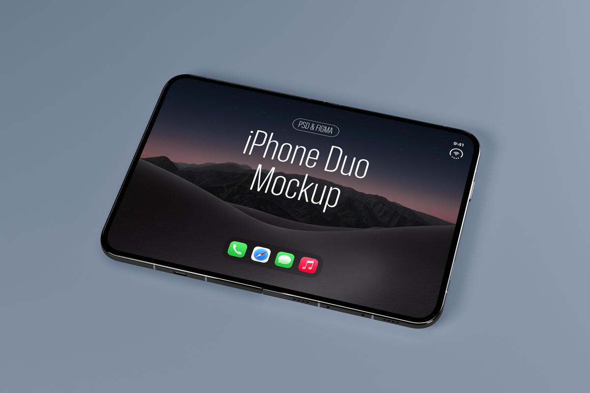 High-angle perspective of a dark unfolded foldable smartphone lying flat, displaying a dark desert wallpaper with app icons and screen title text.