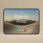 Frontal view of a fully unfolded silver foldable smartphone standing upright, displaying 'iPhone Duo Mockup' over a bright desert landscape wallpaper.