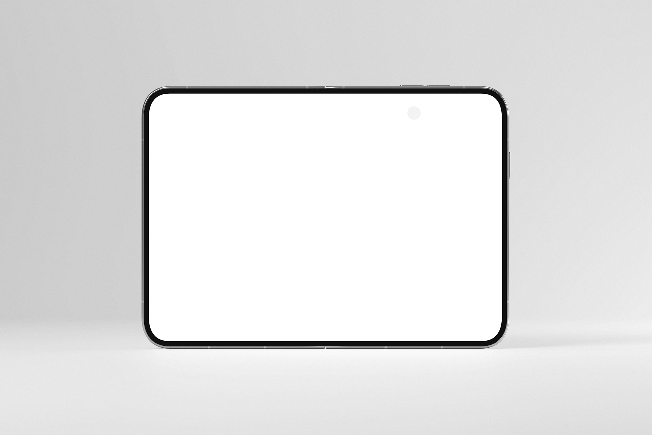 Frontal view of a fully unfolded foldable smartphone standing upright with a blank white display on a light background.