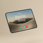 Floating top-down perspective of an open silver foldable smartphone tilted against a light beige background, displaying a desert wallpaper.