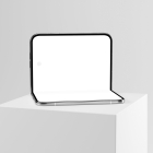 Front view of a partially open foldable smartphone sitting on a white pedestal showcase with a blank white screen.